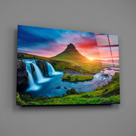 Kirkjufell mountain glass wall art on a plain gray wall, angled to show the glossy surface