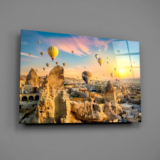 Cappadocia balloons glass wall art on a gray wall, light catching the glossy front