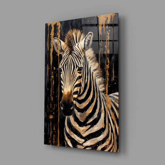 Gold drip zebra glass wall art on a gray wall, light reflecting off the glossy front