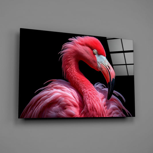 Pink flamingo glass wall art on a gray wall, light reflecting off the glossy front