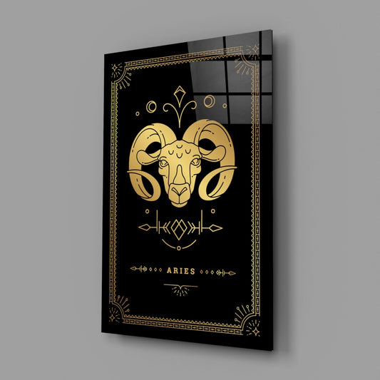 Aries zodiac glass wall art on a gray wall, light reflecting off the glossy black front