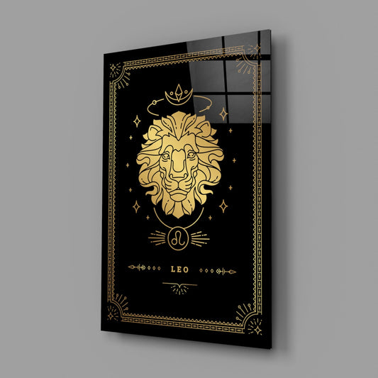 Leo zodiac glass wall art on a gray wall, light reflecting off the glossy black front
