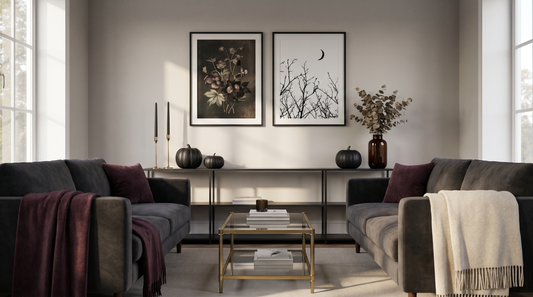 Moody living room with framed Halloween wall art showing halloween decoration ideas for homes in a chic, not cheesy style