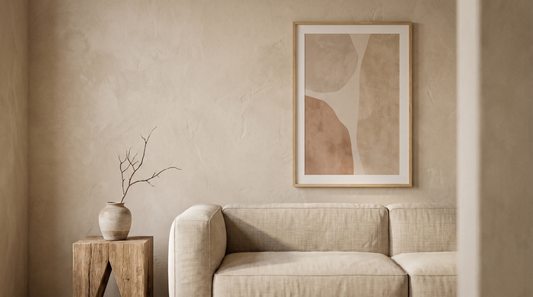 Wabi sabi home decor guide living room with muted earth tones, linen sofa, and a quiet abstract framed print