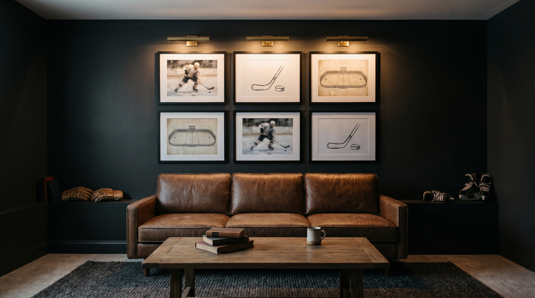 Hockey poster design ideas on a dark game room feature wall above a leather sofa