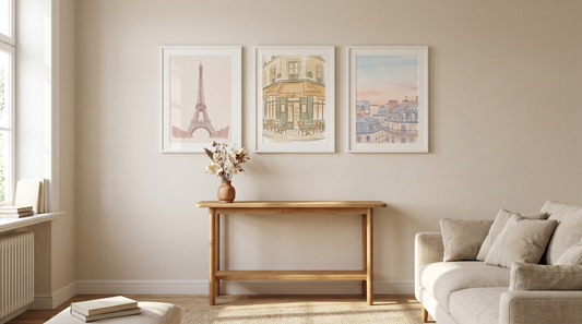 Creative Paris poster ideas: three framed Eiffel Tower and cafe prints grouped above a console