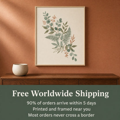 Framed eucalyptus wall art above a walnut console with free shipping and delivery details