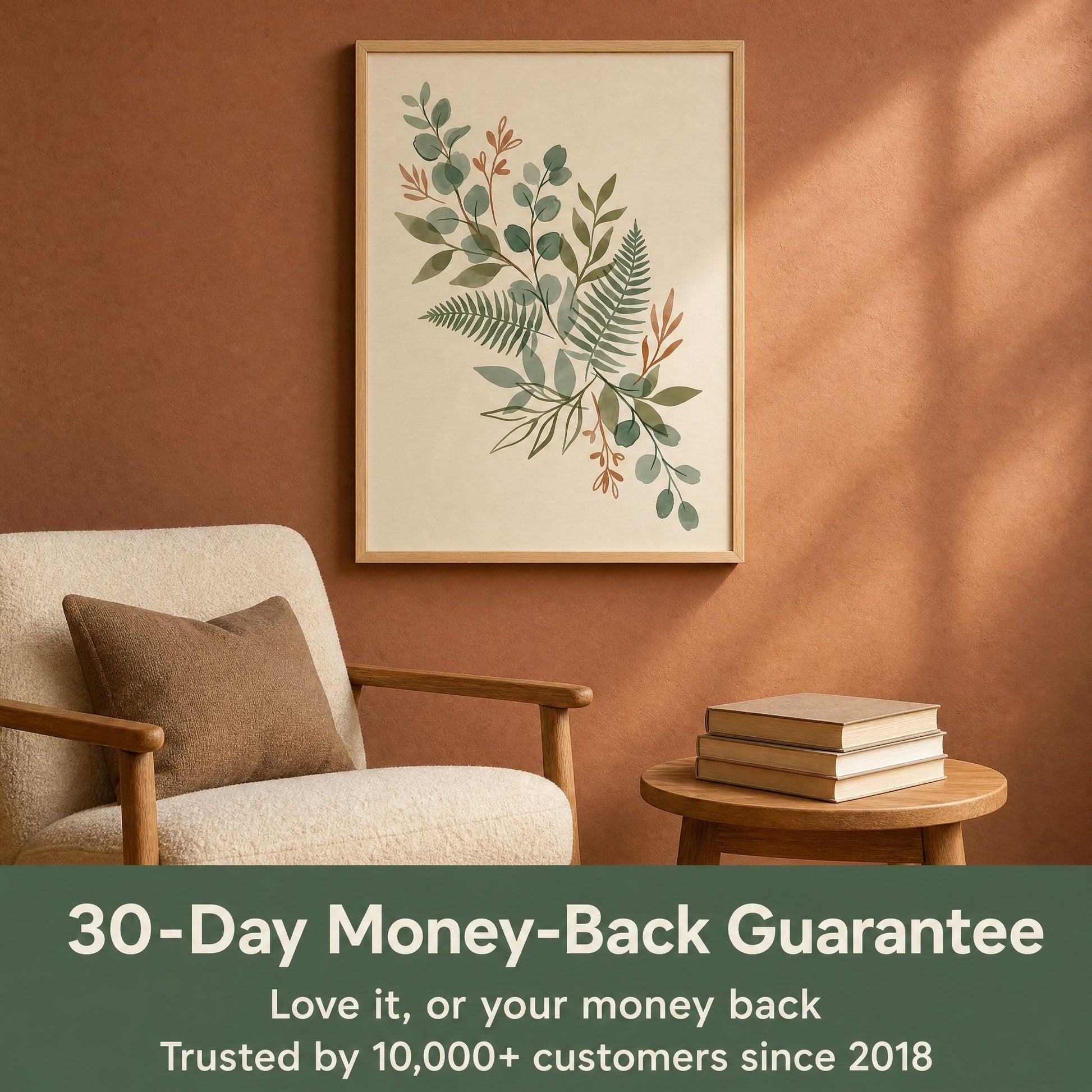 Framed eucalyptus and fern print above an armchair with the 30-day money-back guarantee