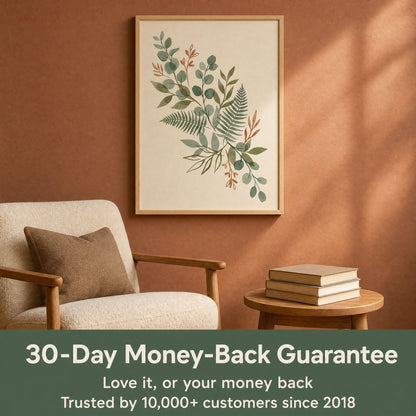 Framed eucalyptus and fern print above an armchair with the 30-day money-back guarantee