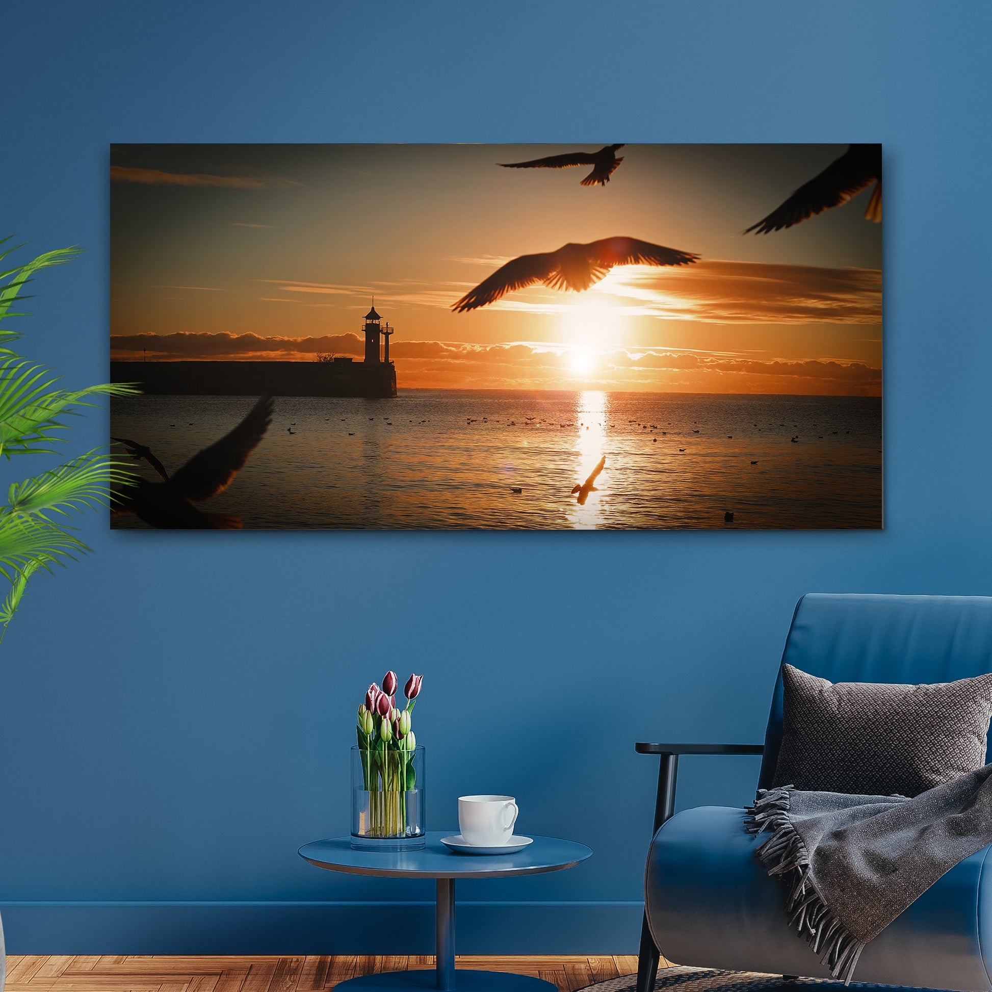 Birds flying across a glowing golden sunrise canvas wall art