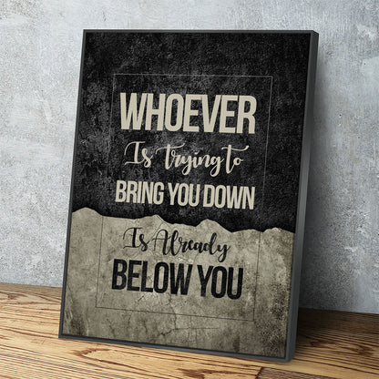 Motivational quote canvas wall art hanging in a home office