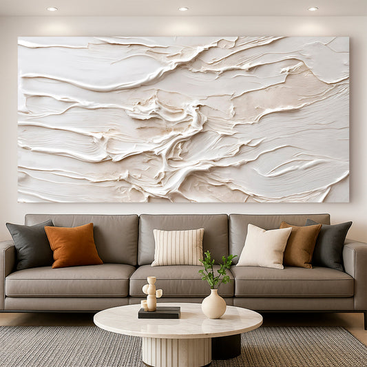 Canvas printed with a white layered abstract in a plaster-art look, hung above a grey sofa