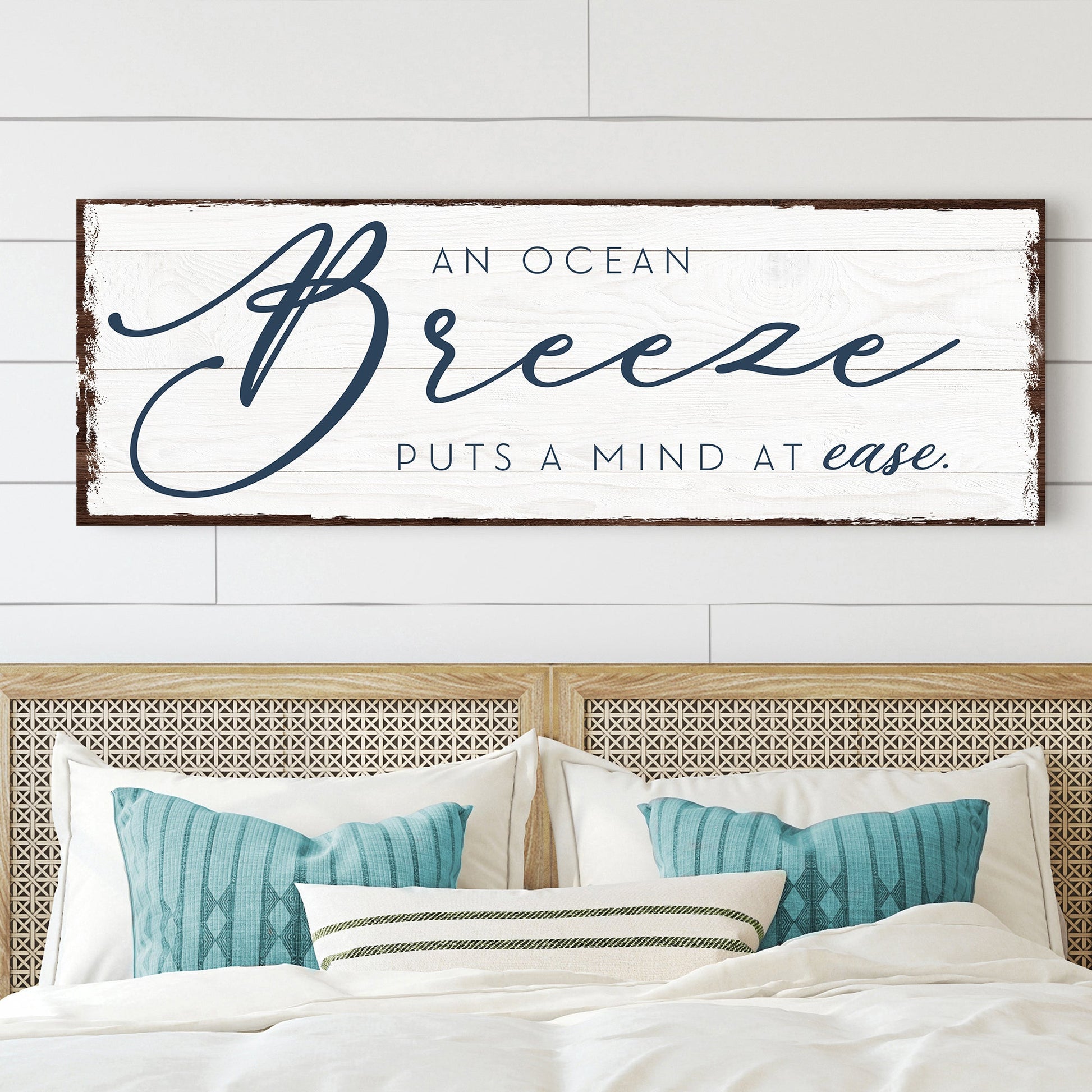An ocean breeze puts a mind at ease canvas sign