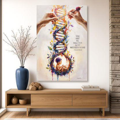Canvas art of two hands knitting a flowering double helix that cradles a sleeping baby, with Psalm 139:13 in small type