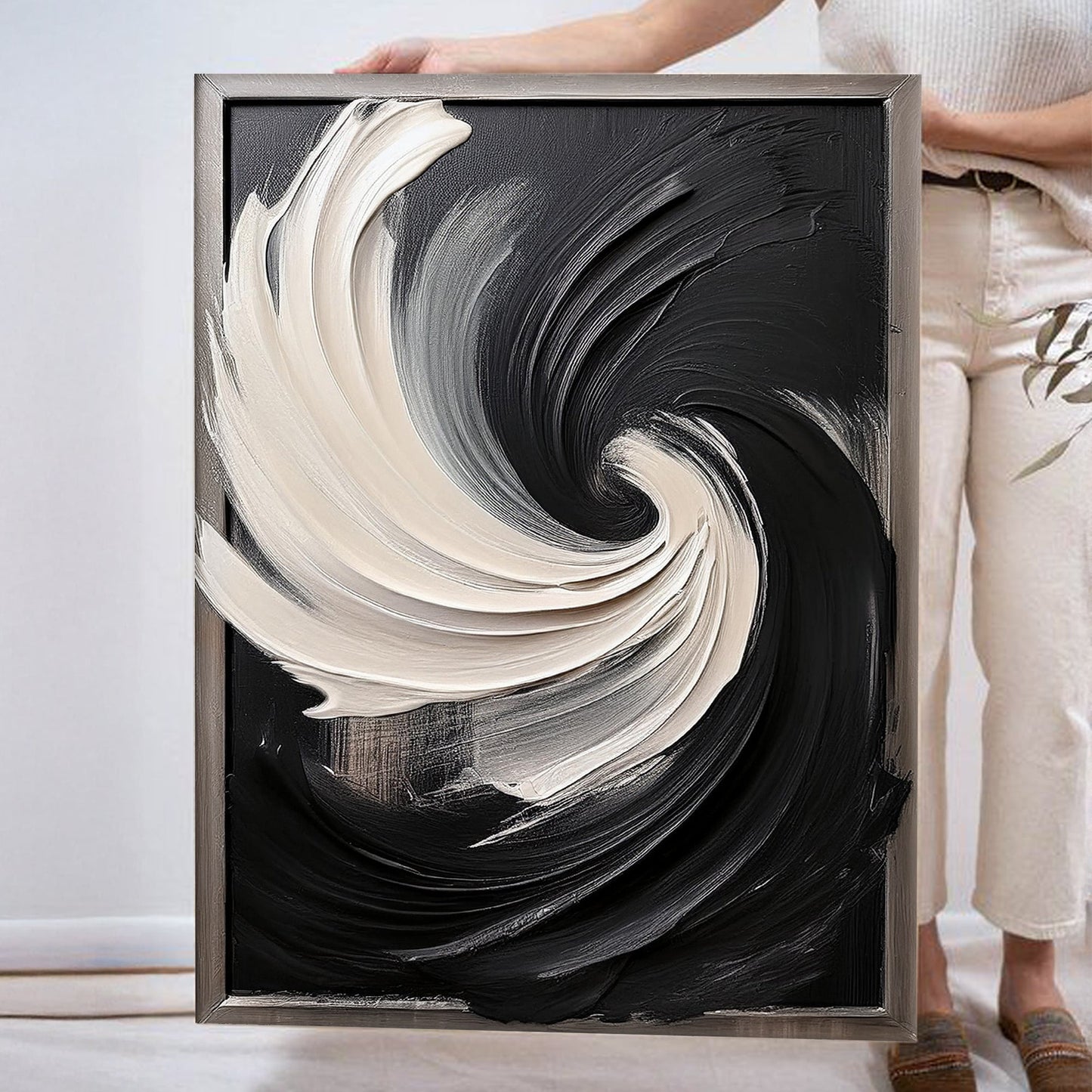 Black and white vortex abstract canvas wall art with dramatic swirling geometric pattern