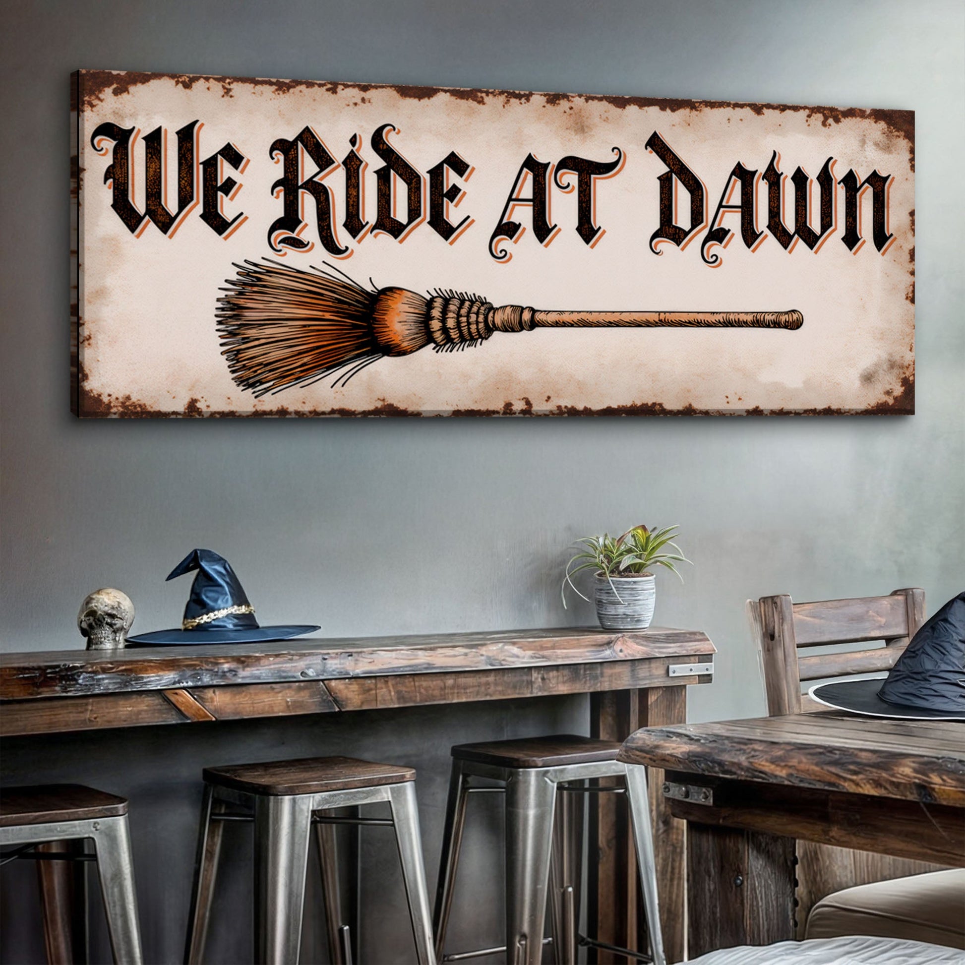 We Ride At Dawn Halloween canvas wall sign with dark gothic typography and spooky imagery