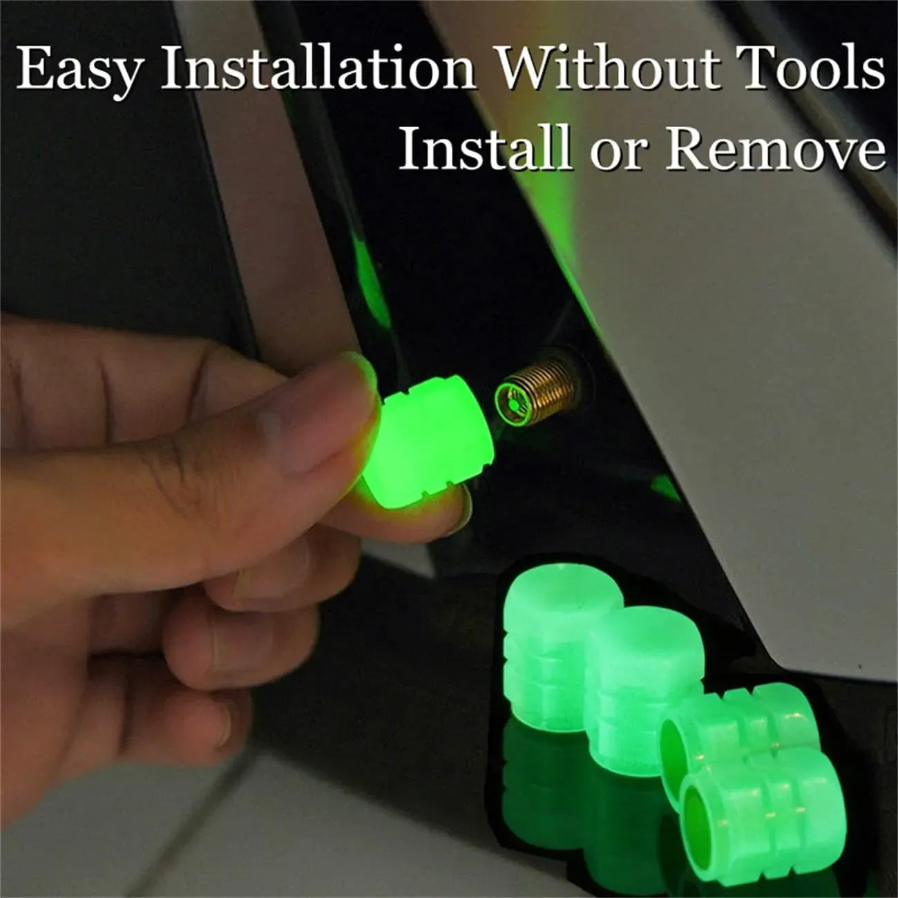 Hand installing glowing valve cap on Schrader tire valve no tools