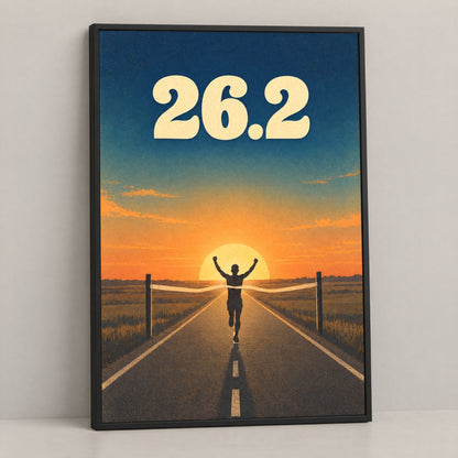 Marathon finish line wall art, a 26.2 runner poster framed in black pine, leaning on a console against a plain wall