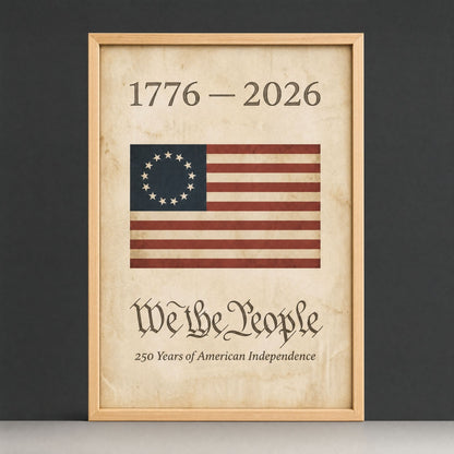1776 American flag wall art in a natural wood frame - the We the People print with its Betsy Ross thirteen-star ring, shown upright on a plain dark studio ground