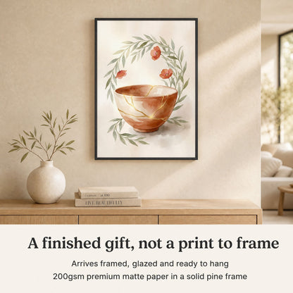 Framed kintsugi print above an oak console, with a note that it arrives framed, glazed and ready to hang