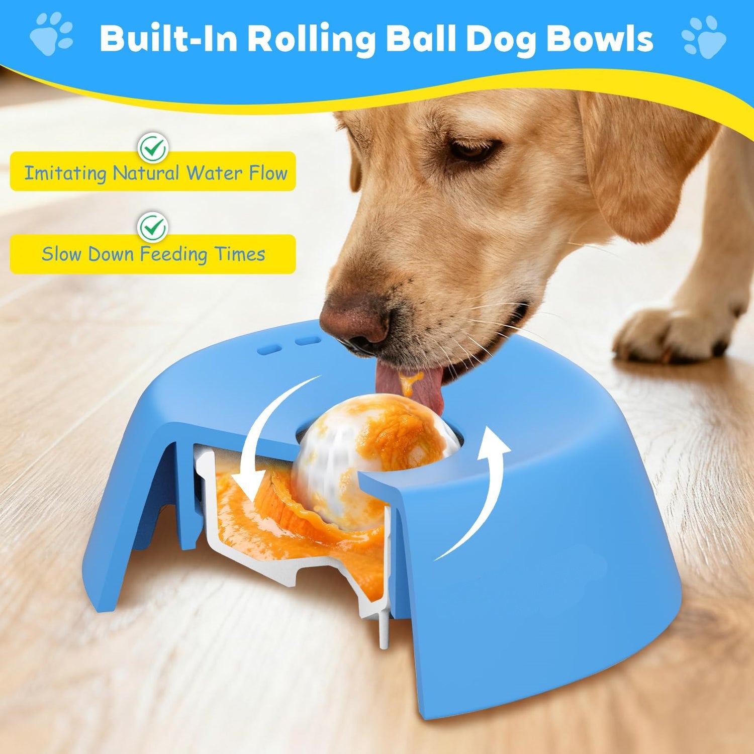 Dog eating from a blue slow feeding built-in rolling dog bowl on a wooden floor.