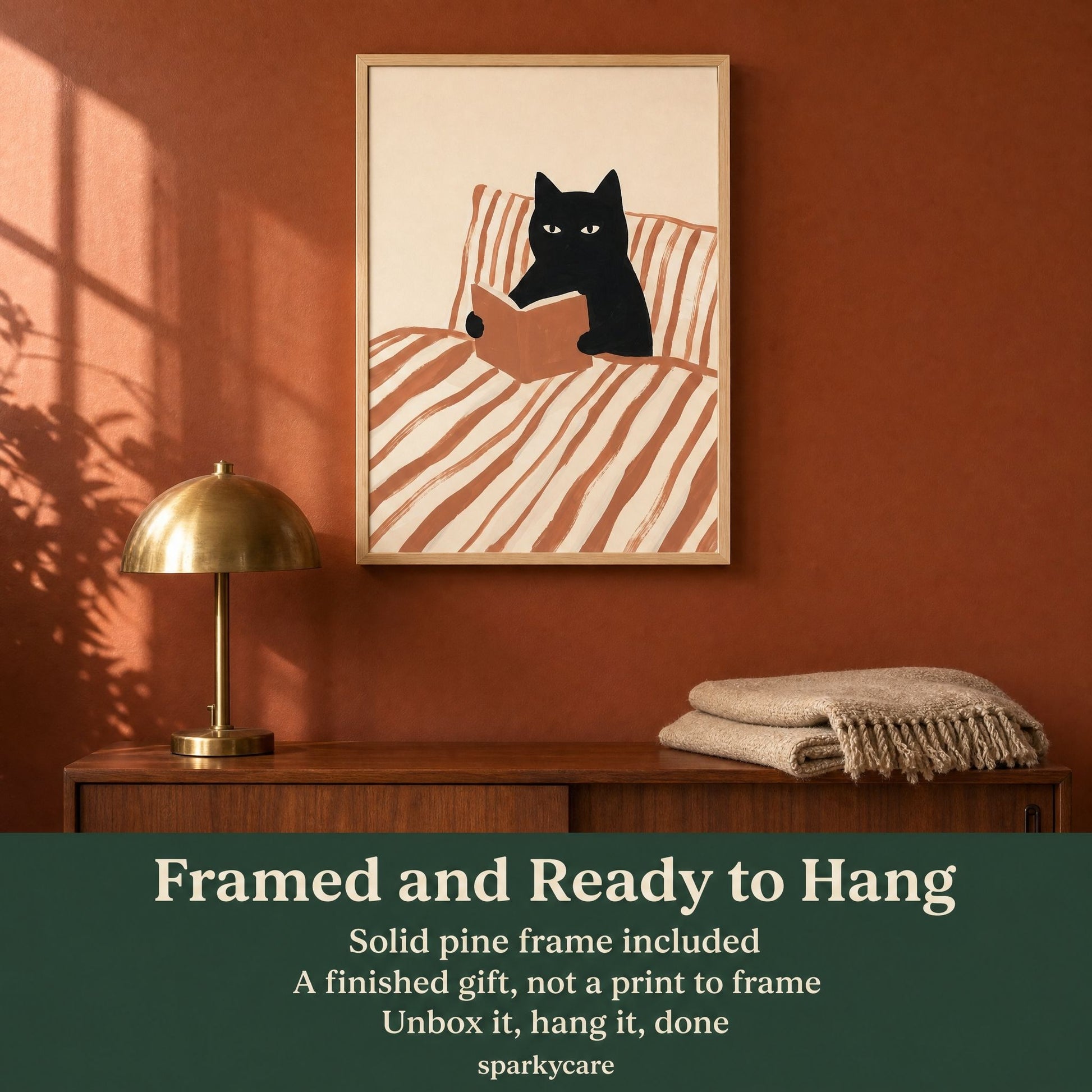 Framed cat reading poster above a walnut console, framed and ready to hang with a solid pine frame