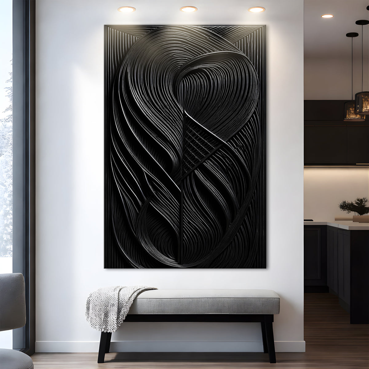 Tall all-black abstract canvas printed with the look of looping carved curves, above a gray bench in a white hallway