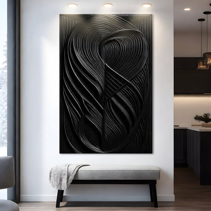 Tall all-black abstract canvas printed with the look of looping carved curves, above a gray bench in a white hallway