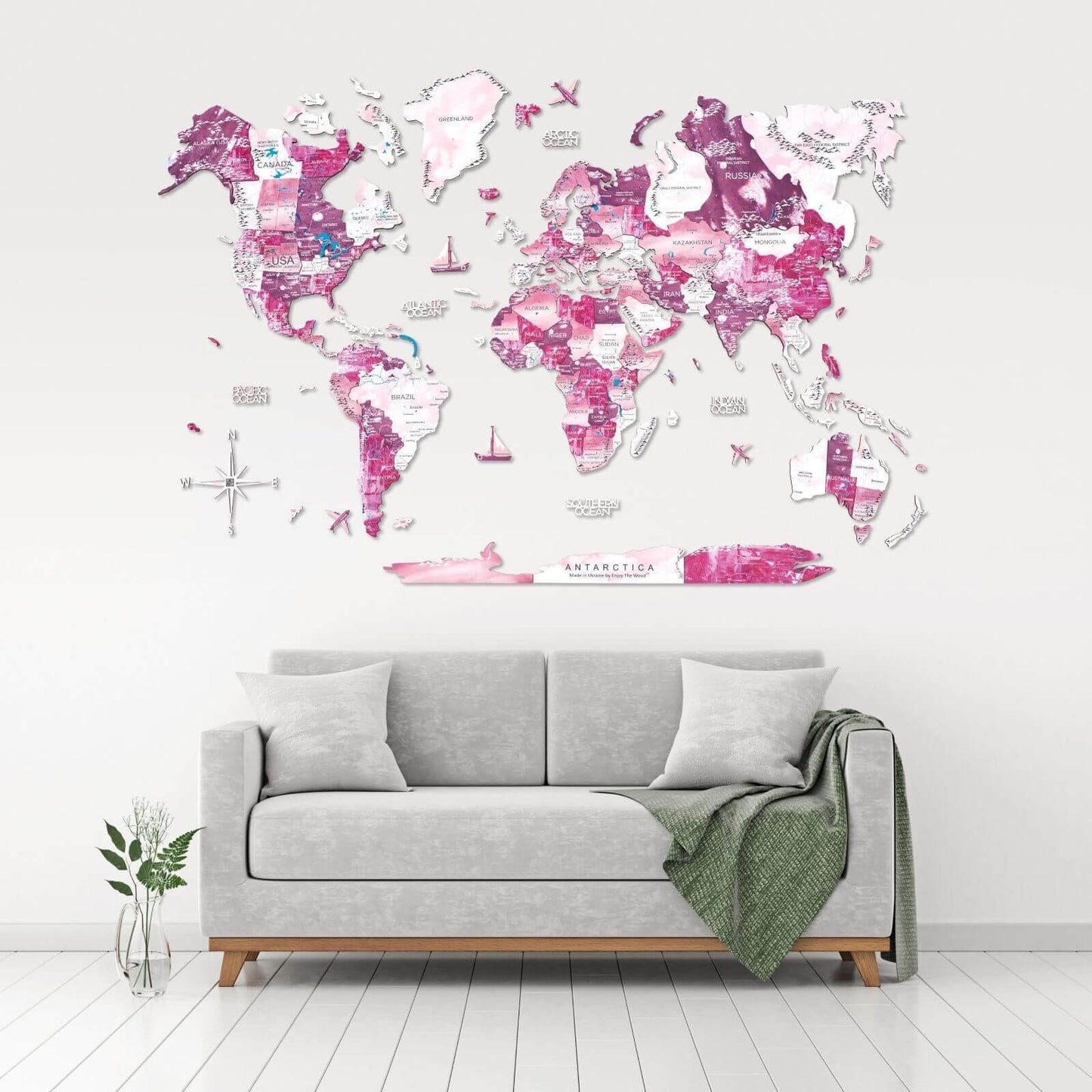 3D wooden world map wall art in soft pink tones