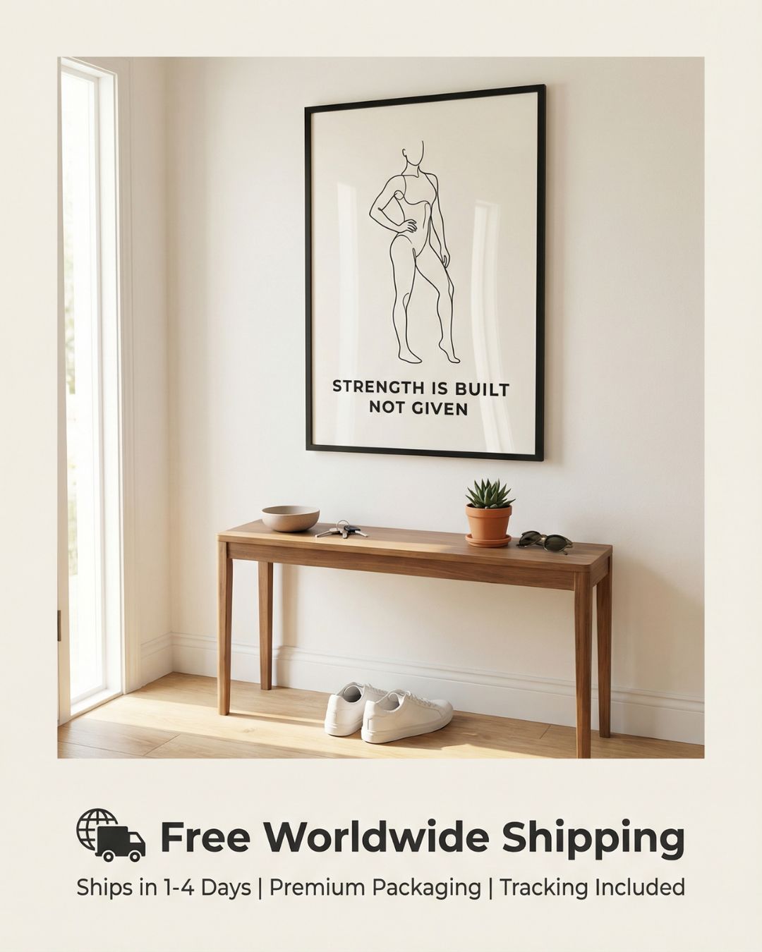 Framed artwork on a wall above a wooden console table with decor items.