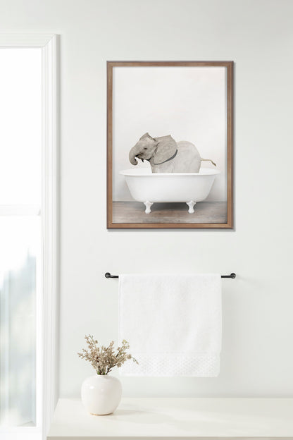 Baby Elephant in the Tub Framed Glass Wall Art