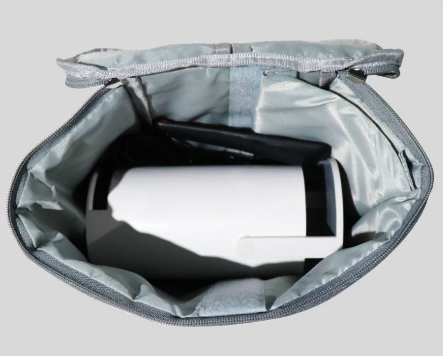 Gray insulated smart projector bag with a black and white container inside on a light gray background