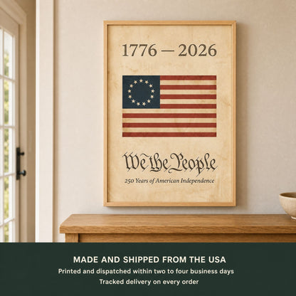 Framed 1776 American flag wall art above an oak entry console, with a panel giving production times and tracked delivery on every order