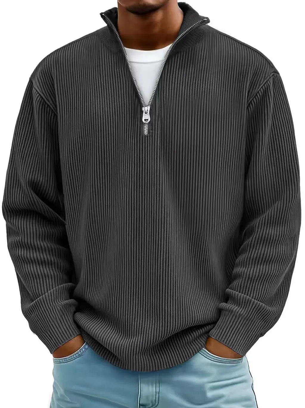 Man wearing a gray ribbed quarter-zip sweater with a white shirt underneath on a white background