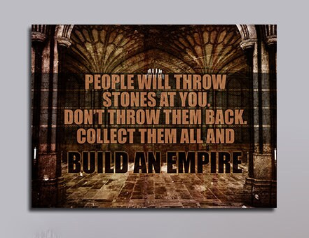 Build An Empire motivational canvas wall art above a desk