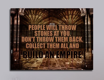 Build An Empire motivational canvas wall art above a desk