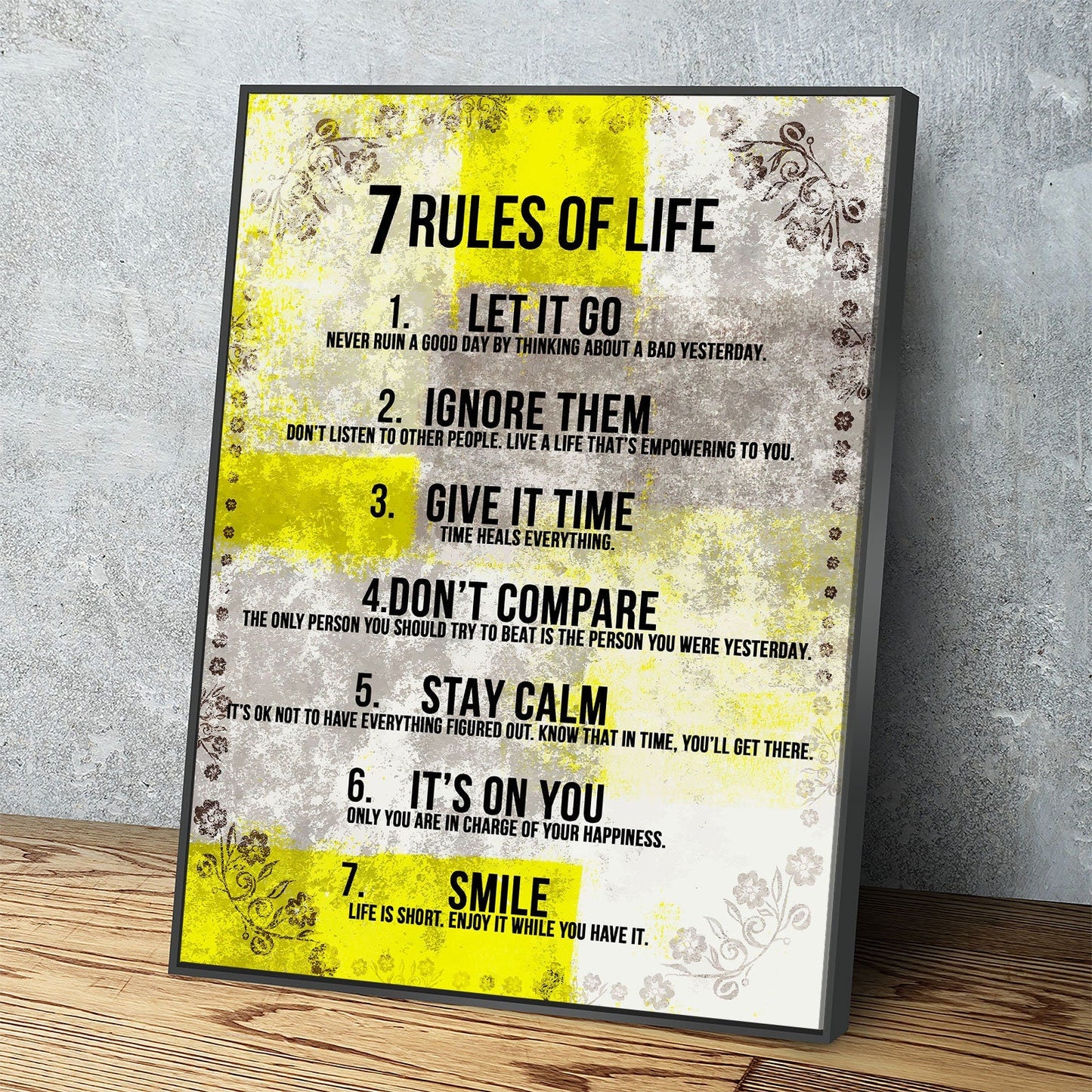 7 Rules Of Life motivational canvas wall art in an entryway
