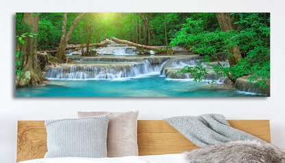 Waterfall Paradise nature canvas wall art above a living room couch