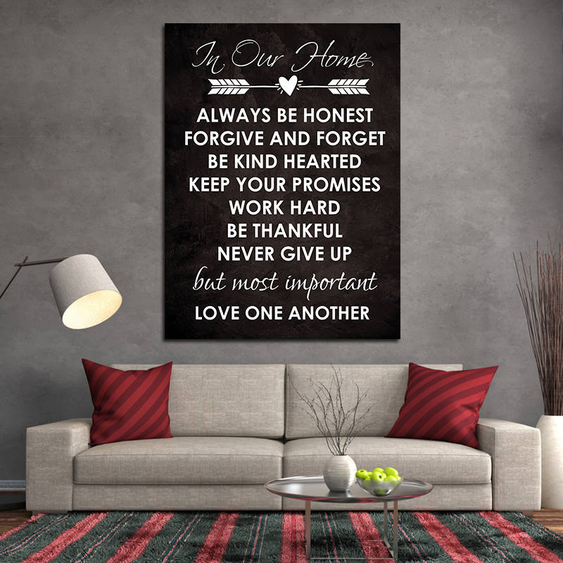 In our home family values sign canvas in an entryway