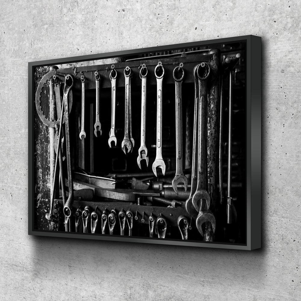 Mechanic tools canvas wall art in an auto shop office
