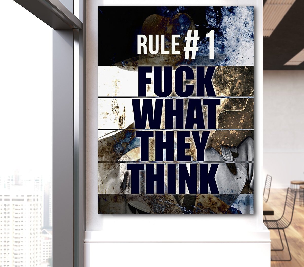 Bold motivational canvas wall art in a home office