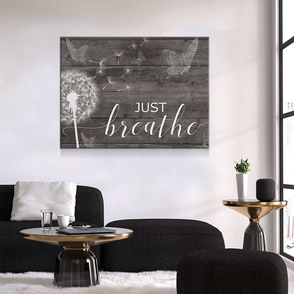 Just Breathe canvas wall art above a bed in a romantic bedroom