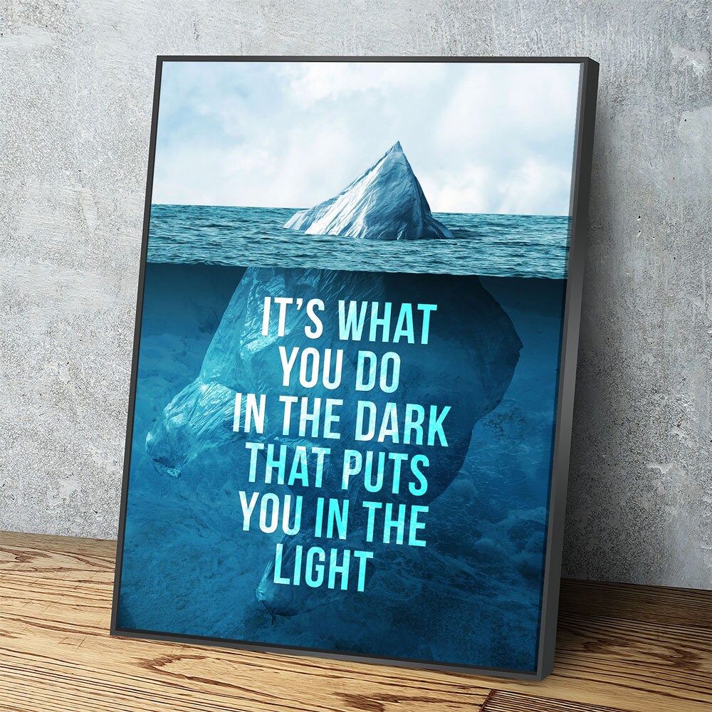 It's What You Do In The Dark motivational canvas wall art in a home gym
