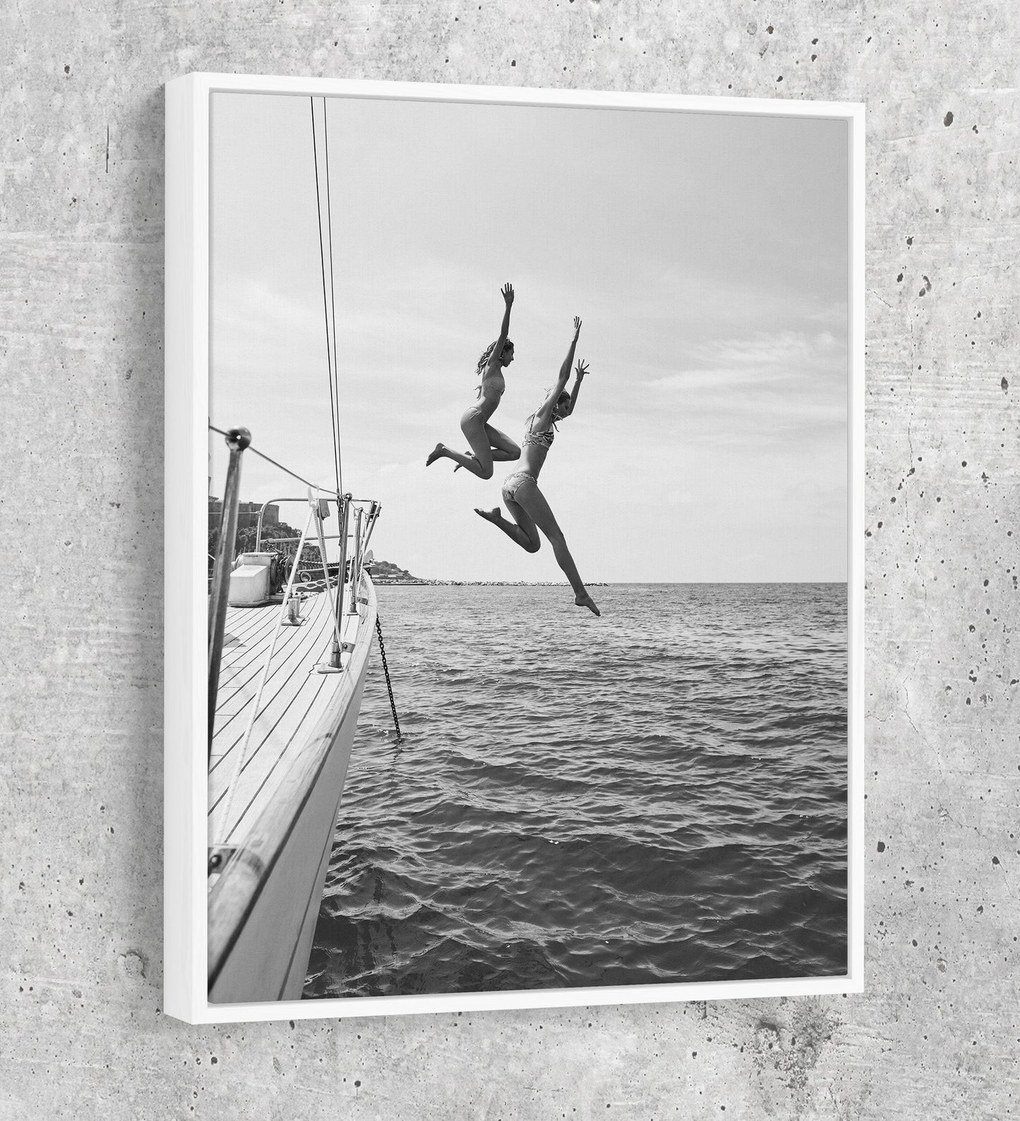 Friends jumping off a yacht into ocean water canvas wall art