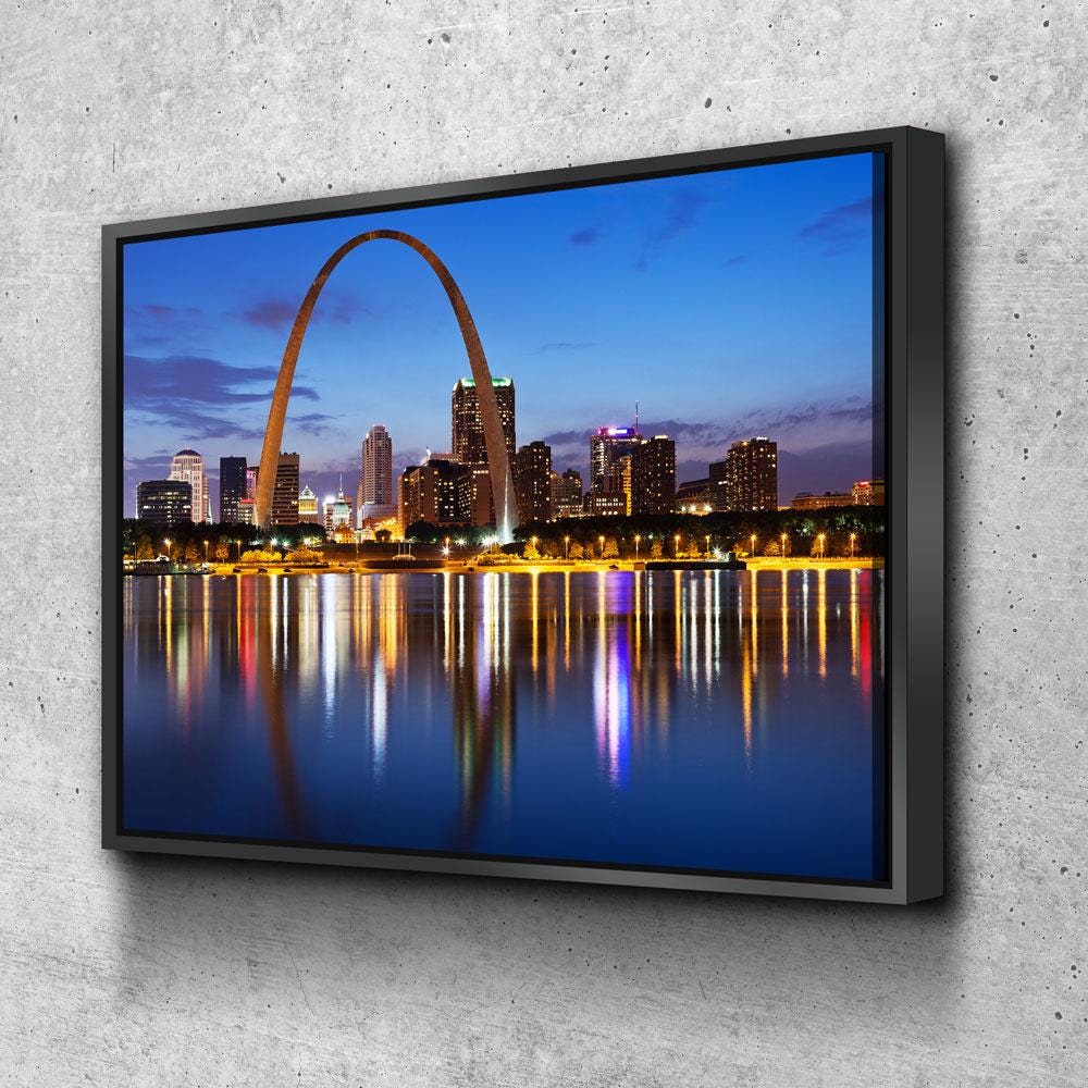 St. Louis Skyline canvas wall art with Gateway Arch in a living room