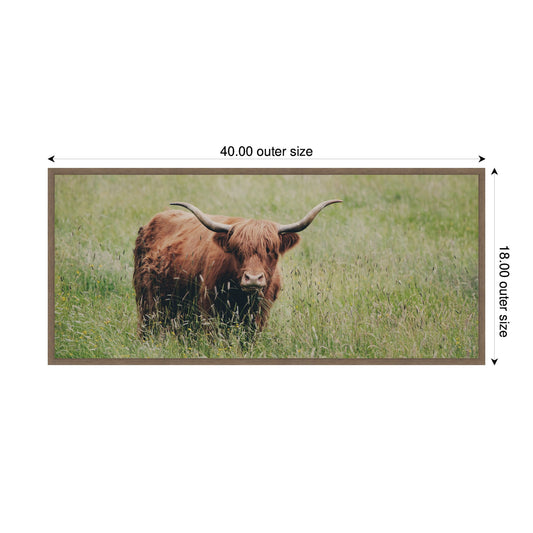 Highland Cow in a Green Field Framed Canvas Wall Art