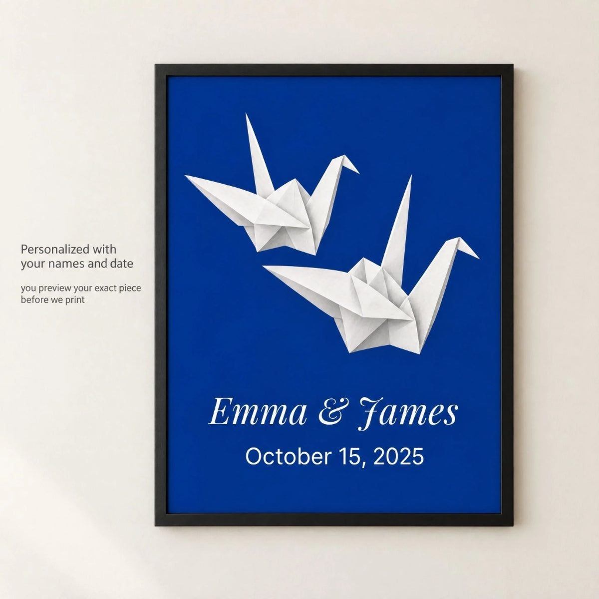 Paper cranes anniversary print personalized with a couple's names and wedding date, shown framed