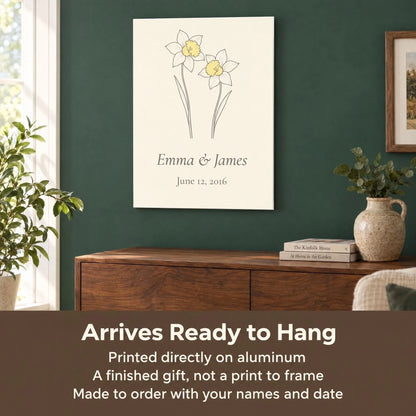 Daffodil aluminum print above a sideboard, arrives ready to hang and made with your names and date