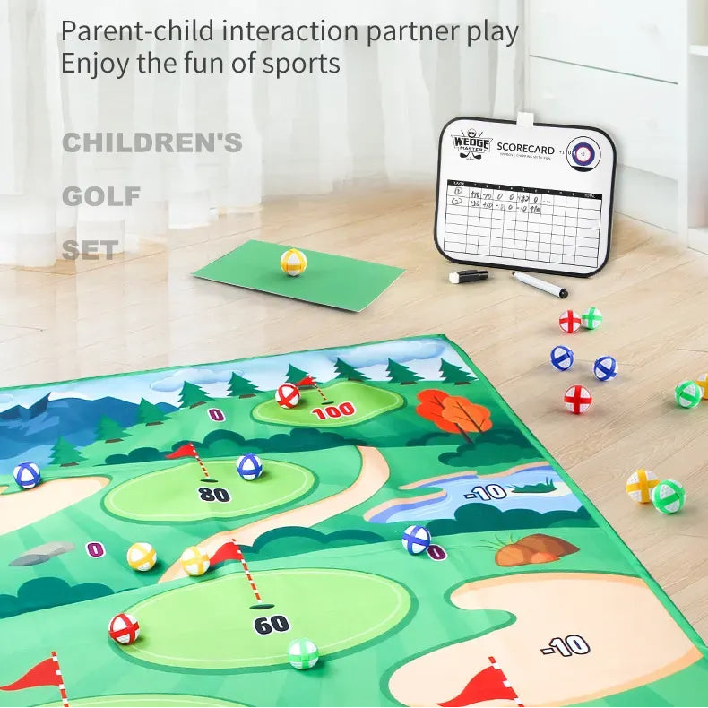 Children's golf set with a play mat, balls, and a scorecard on a wooden floor.