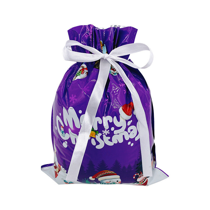 Purple gift bag with 'Merry Christmas' text and white ribbon on a white background